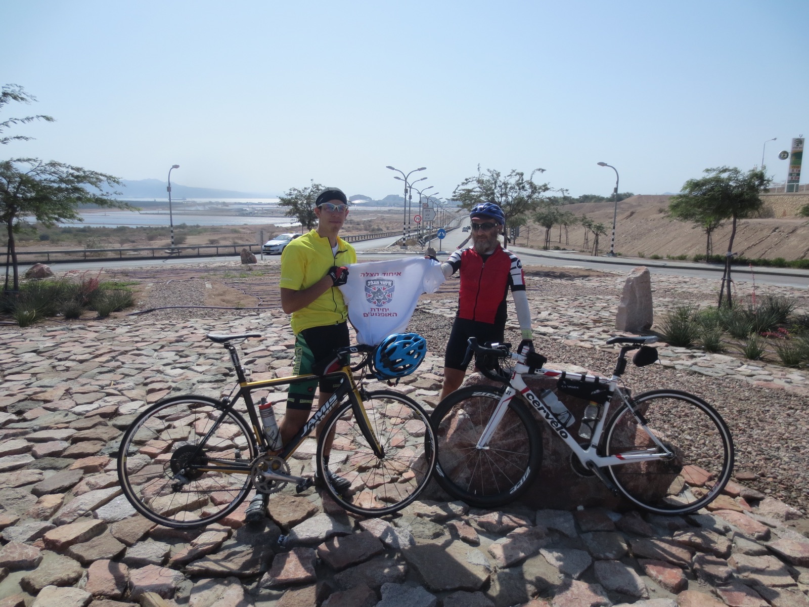 Daniel Shore finishing his 24 hour and 5 minute cross country bicycle ride in Eilat.